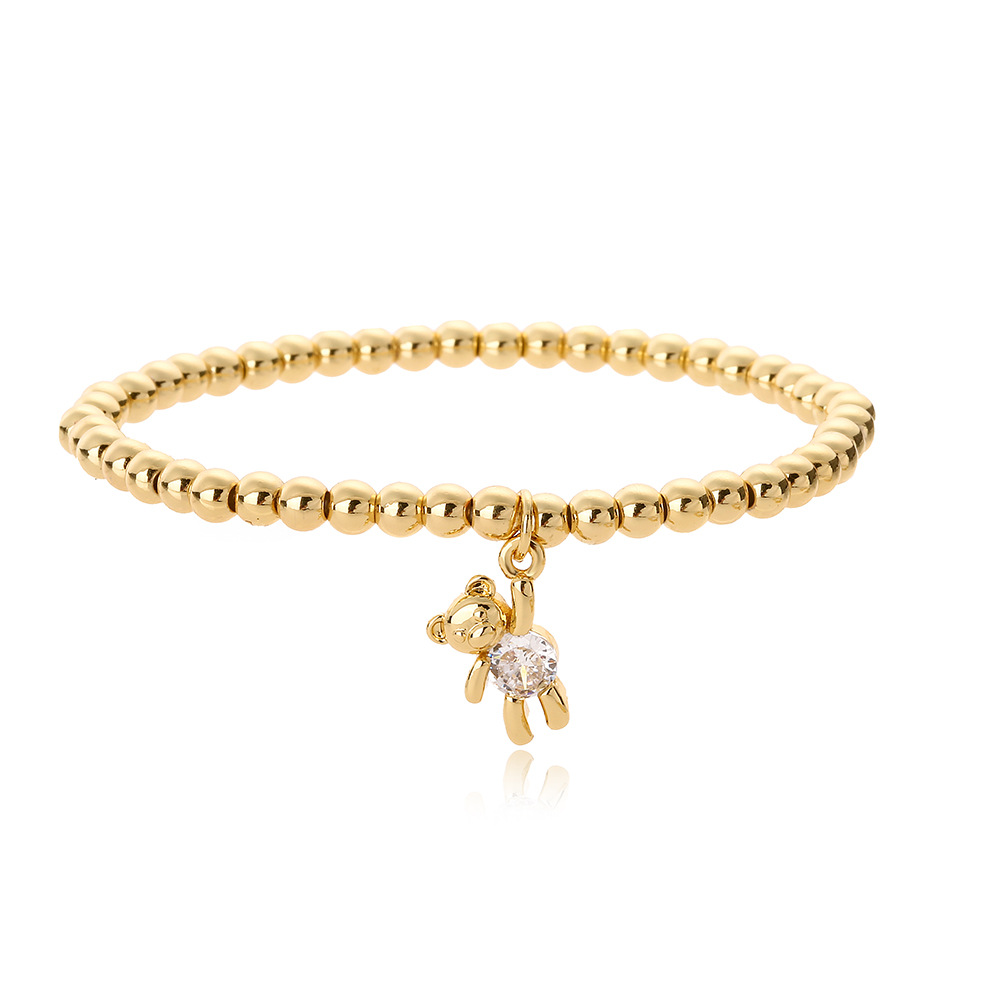 Bracciale con pendente orsetto e perline in rame e zircone donna_voghion.com