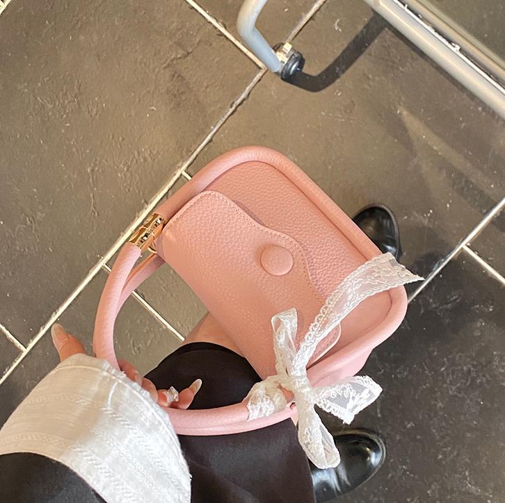 Casual tendencia portátil mini bolso 2025, nuevo nicho de bolso de hombro universal, sensación de alto nivel, simple mochila para mujeres