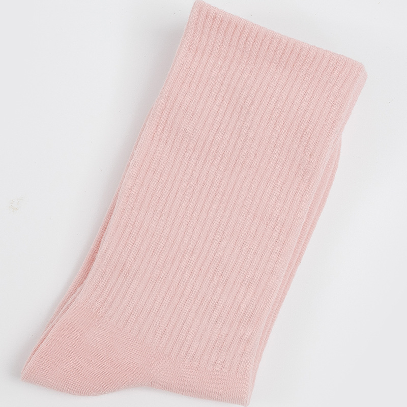 Calcetines de mujer para primavera y otoño, calcetines de algodón de color liso, versátiles y a la moda, calcetines holgados, calcetines de longitud media, calcetines deportivos que absorben el sudor, venta al por mayor.