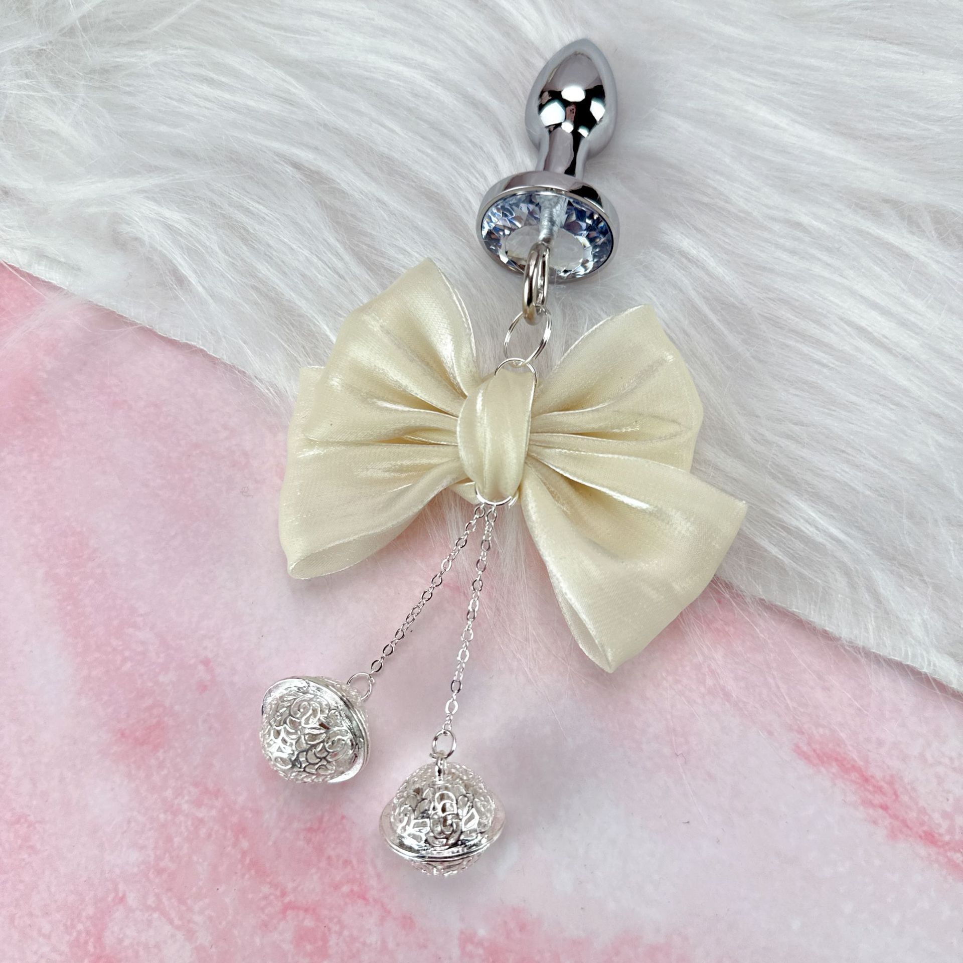 Fábrica directa de artículos sexuales SM esclavo femenina arco de cuentas cadena de leche clip pareja coqueteo artículos de venta