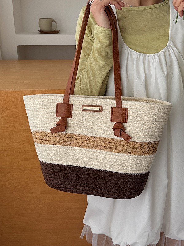 Bolso de mano de gran capacidad para mujeres 2026 verano nuevo estilo de moda tejido bolso de hombro brazaleta de viaje bolsa de ocio