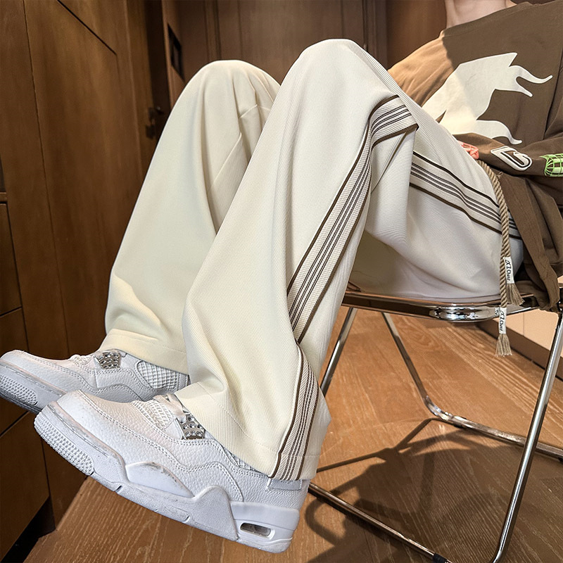 Pantalones de banda de tejido espesa de veludo para hombres pantalones de cauda vertical holgados, pantalones casuales de moda estadounidenses de otoño y invierno