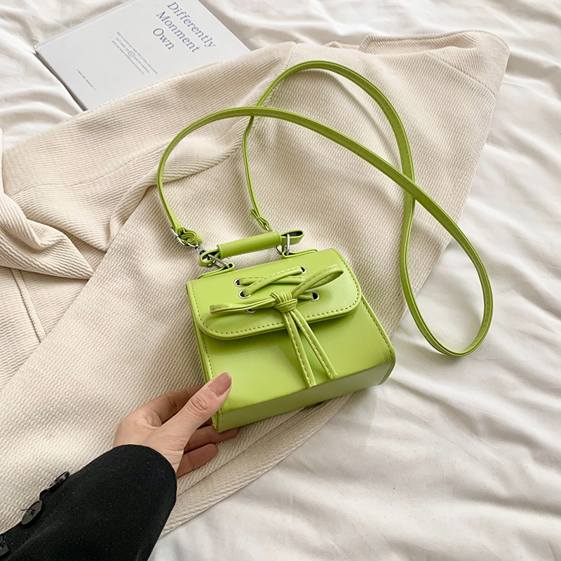 Diseño coreano de nicho bolso de mujer 2024 mini personalidad versátil bolso de moda arco de hombro bolso pequeño