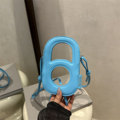 夏季仙女小包包2025新款时尚网红镂空手机包小众女士凹造型斜挎包