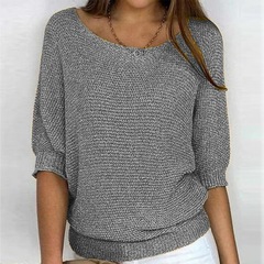 春の新商品は国境を越えて欧米風の純色の丸首のニットの女性の通勤の優雅な7分の袖の上着のエアコンのシャツです。