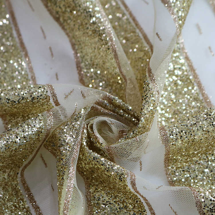 Fabricantes promocionales de bajo precio rociado oro rociado oro alto brillo vestido de boda tela de encaje accesorios