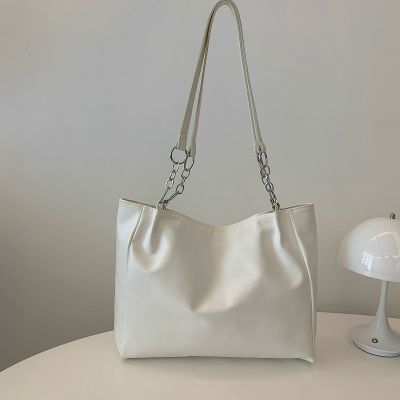 Alta sensación de bolso grande para mujeres 2024 nueva moda de verano de moda de gran capacidad de transporte bolsa bolsa de hombro de textura de mujer