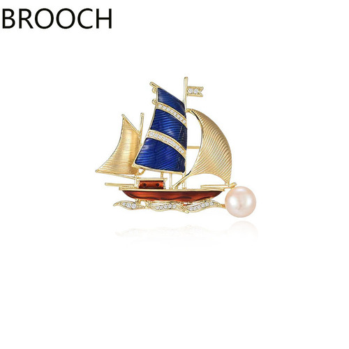 High-end temperament Korean-style brooch for women, featuring a oil ship sail design, with pearls and a stylish anti-slip fastener, elegant and fashionable.