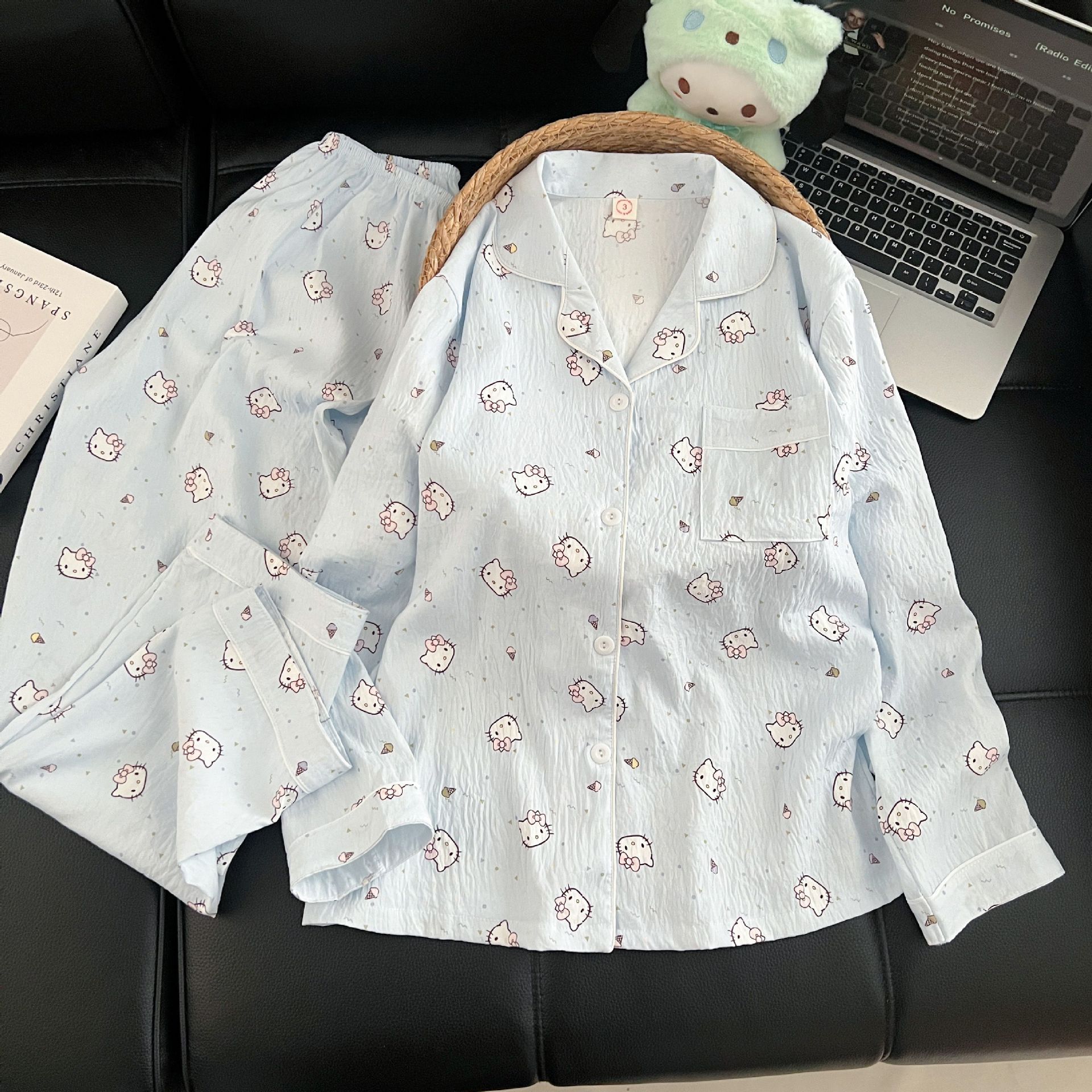 Al por mayor transfronterizo KT gato pijama mujer primavera y otoño nubes algodón manga larga 2026 nuevo juego de ropa de hogar encantadora super caliente