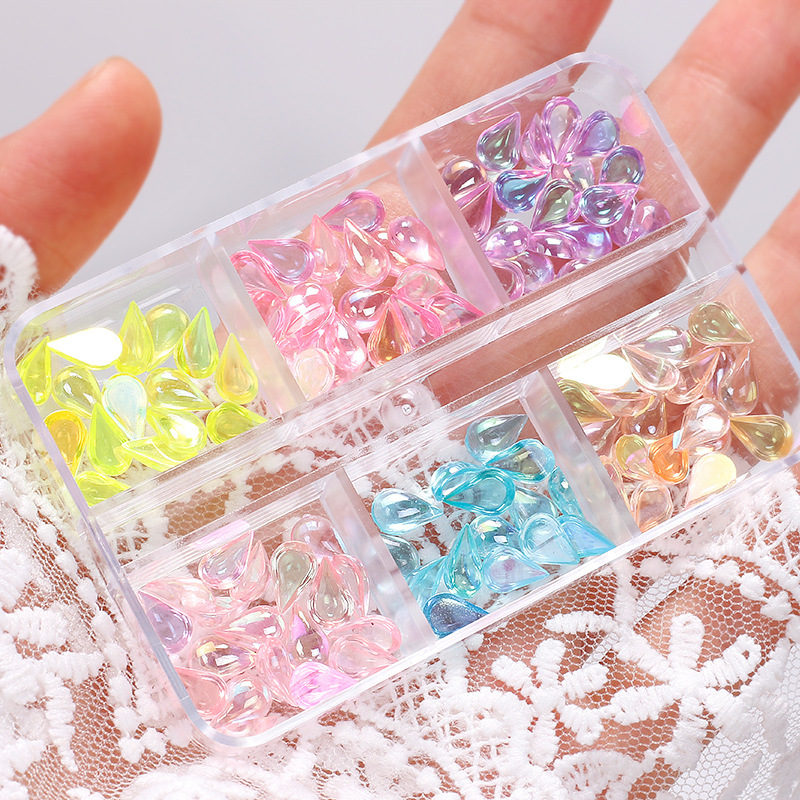 En línea de la celebridad de uñas dulces joyas de diamantes al por mayor resina tridimensional Aurora color mágico señaló larga octogonal caja de diamantes en forma especial