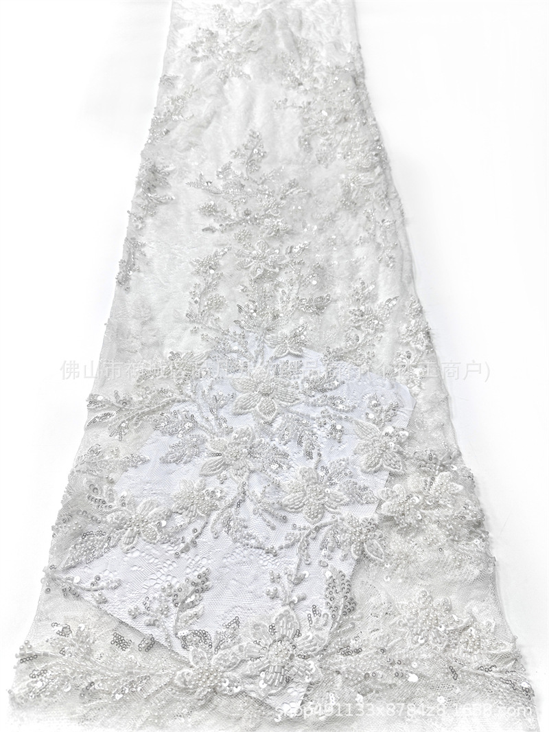 Fábrica directa venta al por mayor de alta calidad posicionamiento tubo de perlas tela de encaje vestido de novia moda tela de moda