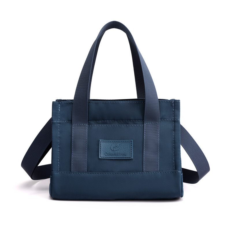 Bolsos de mujer de nylon impermeables transfronterizos, bolsos de moda y sencillos, bolsos de personalidad, compras ligeras, bolsos de hombro único portátiles