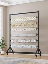 纺织面料布料展示移动样布架纺桌布塑料薄膜展架展会挂布卷货架