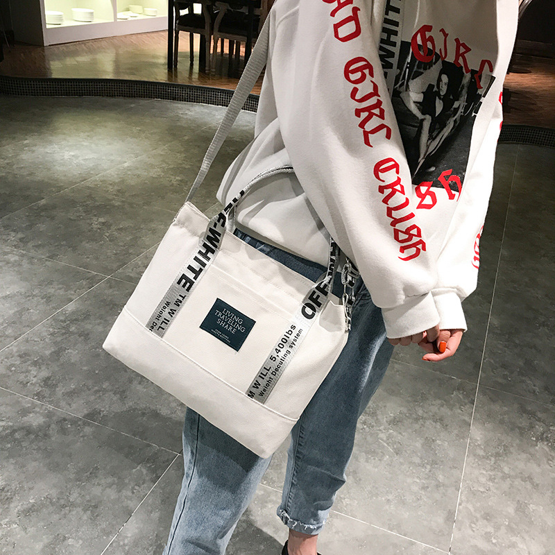 Versión coreana del bolso japonés fresco para mujer, bolso de lona, bolso de mensajero portátil de un solo hombro grueso, bolso popular de estilo literario