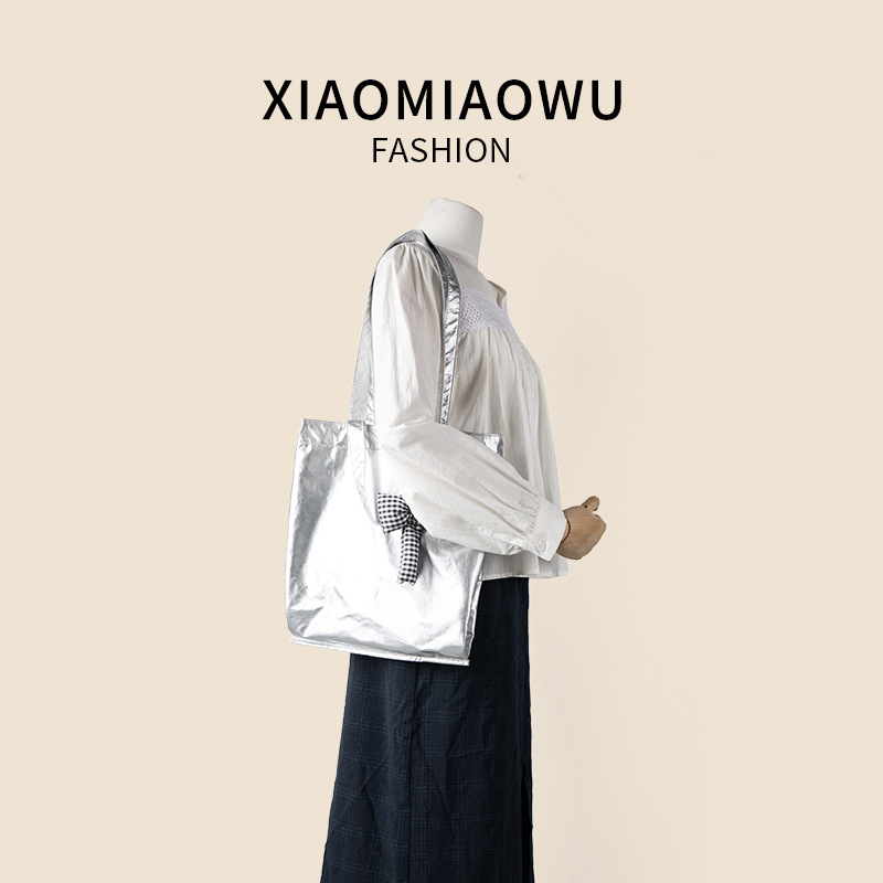 Niche underarm bow, Korean style tote with texture, large capacity, high-end feel, new shoulder bag for commuting_voghion.com