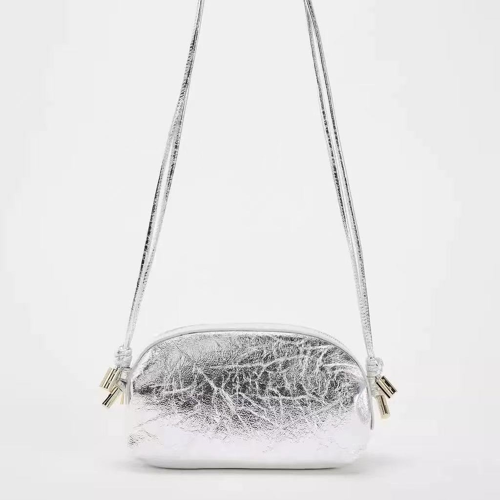 跨境女包2025新品斜跨银色金属系椭圆形单肩时尚斜跨小包女通勤包