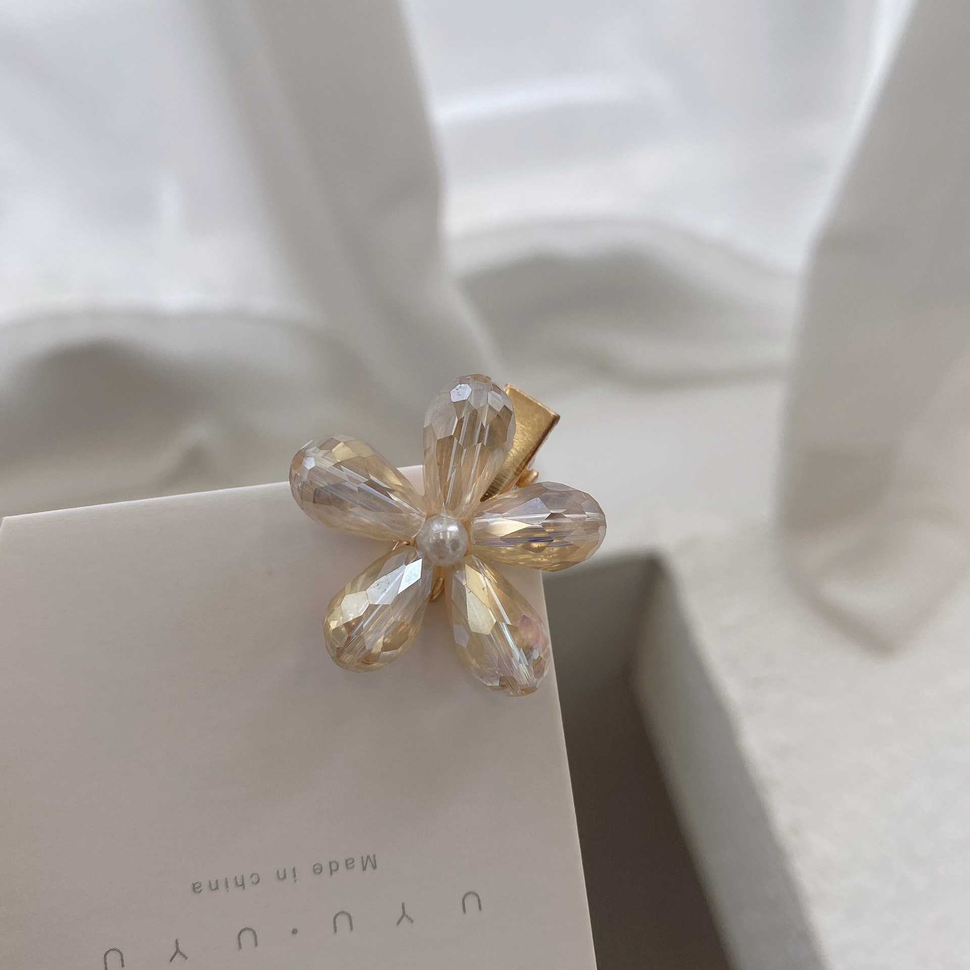 Pequeña flor de cristal-beige