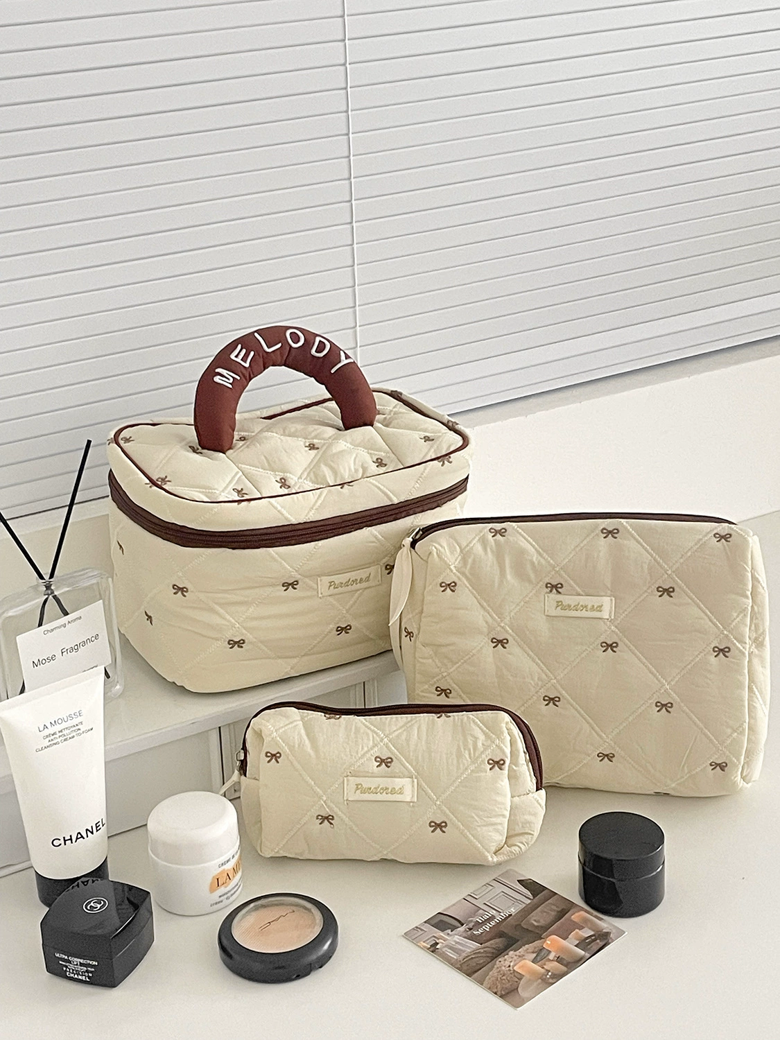 Capacious cosmetic bag with bow, handheld soft organizer bag, flowered