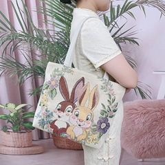卸売りの新しい両面の金糸のジャカードの刺繍のウサギの象の女の子のショルダーバッグの民族の風の手提げの通勤の包み