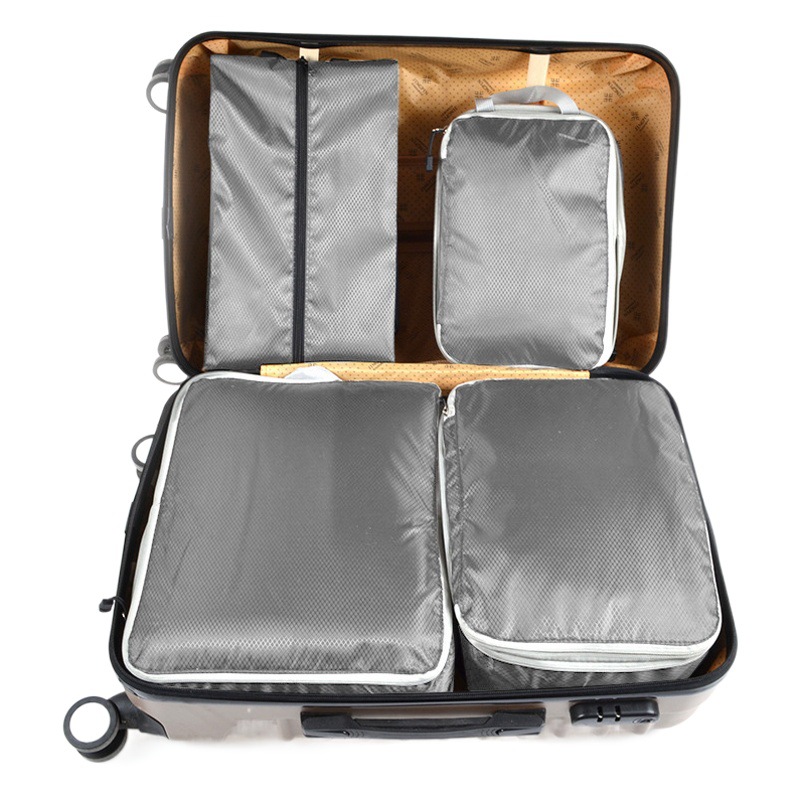 Bolsa de almacenamiento comprimida transfronteriza ropa de cuatro piezas y zapatos bolsa de almacenamiento bolsa de expansión con cremallera bolsa de viaje impermeable traje