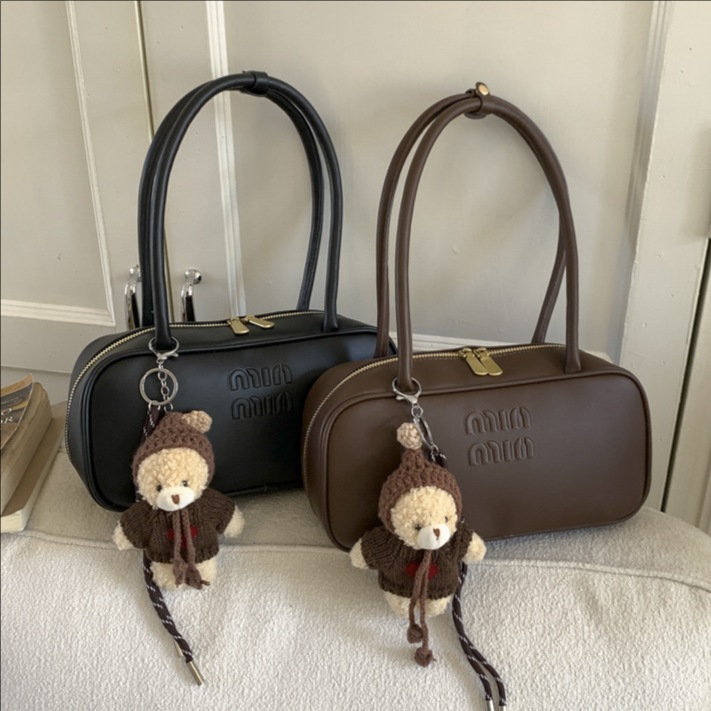 Retro texturas coreanas bolsas debajo de las axilas para mujeres 2025, invierno nuevo bolsas de almohada de estilo extranjero, bolsas de hombro de Boston.