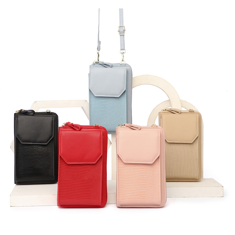 Suministro transfronterizo 2021 nueva bolsa de teléfono móvil para mujer billetera con cremallera vertical patrón de serpiente versátil bolso de hombro crossbody de estilo coreano