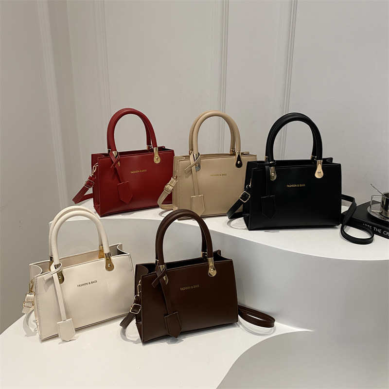 Bolso de mano para mujeres 2024 nueva moda de invierno para viajar bolso cuadrado bolso especial de aire extranjero bolso de hombro simple de viento