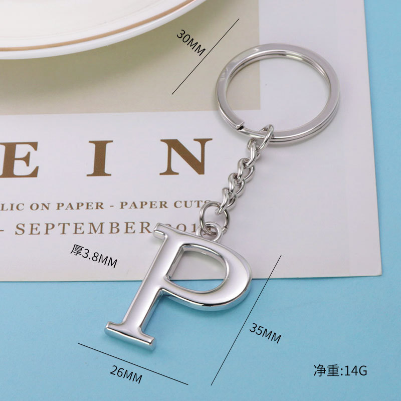 Inglés carta llavero bolsa colgante 26 letras mayúsculas y minúsculas y números llavero europeo y americano pequeño regalo personalización