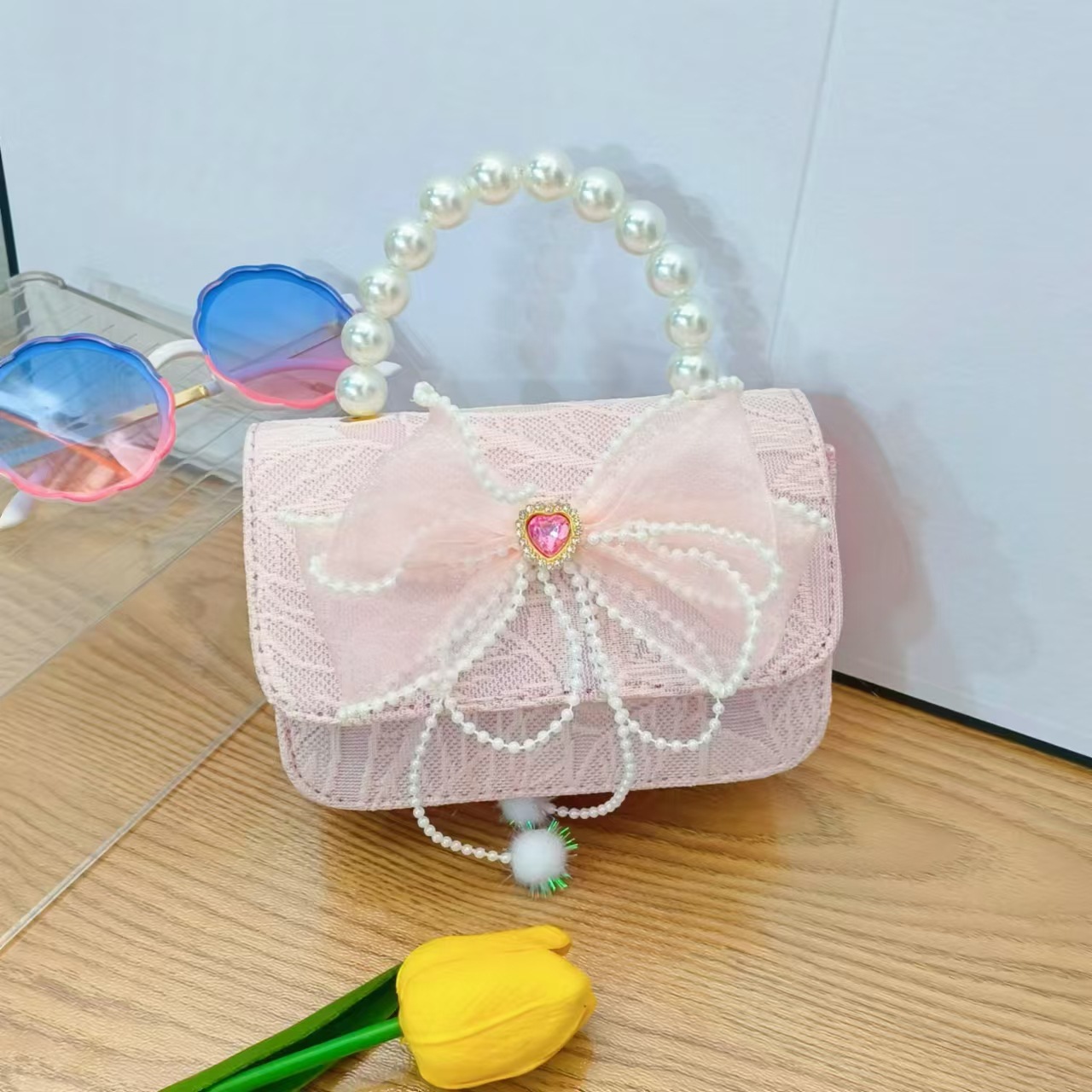 Bolso de princesa con lazo Bolso de perla Bolso de mensajero de cadena Bolso de hombro para niñas Bolso de niño con fragancia pequeña Bolso de accesorios