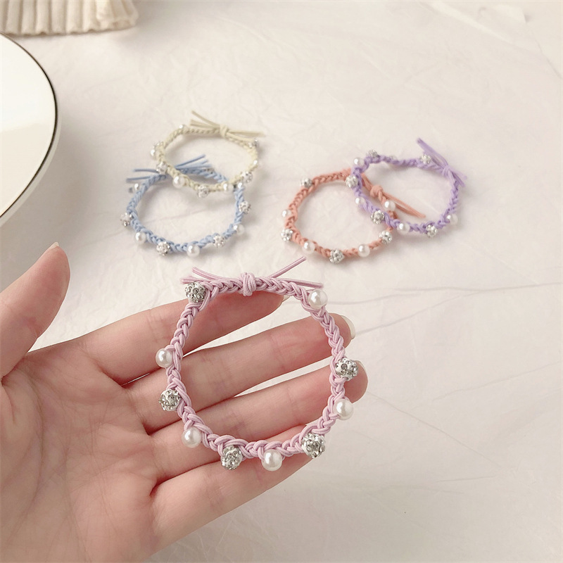 Cordón de cabeza mujer ligera de lujo temperamento torcido de alta elasticidad duradera cabello adulto atado banda de goma simple anillo de diamante