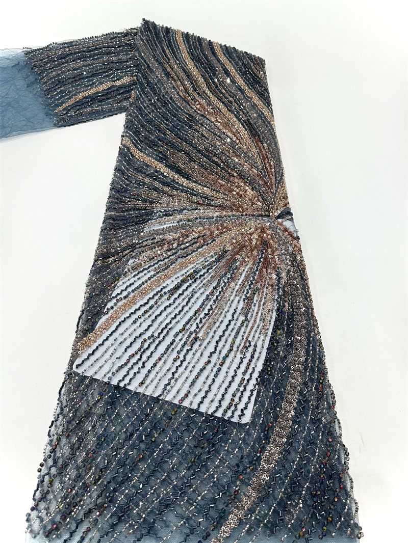 Tejido de malla de bordado de industria pesada bordado de tubo de perlas tridimensional vestido de boda cena tela de moda spot transfronterizo