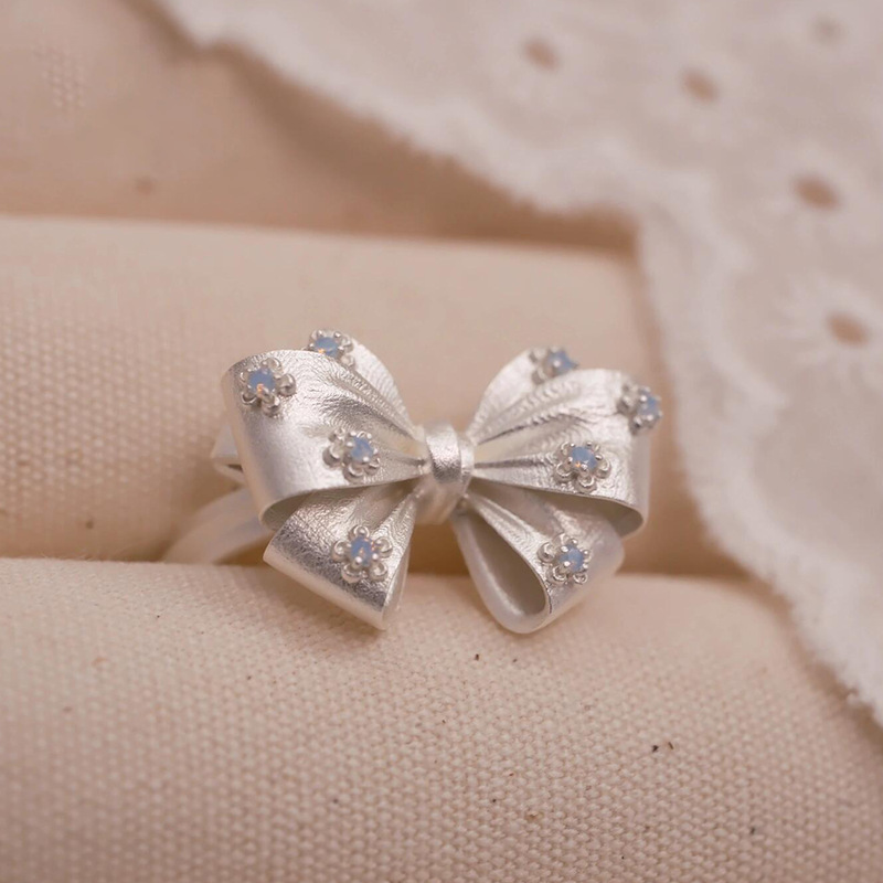 Anello fiocco in argento sterling 925 con diamanti regolabile_voghion.com