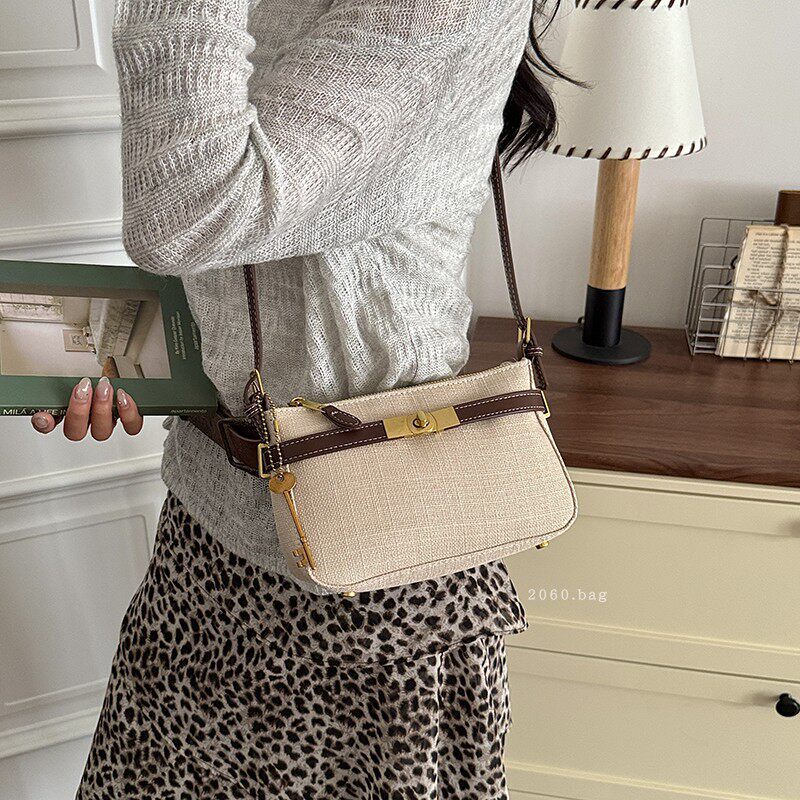 Nueva bolsa de verano coreana de estilo diagonal, color de contraste, su bolso cuadrado de textura debajo de las axilas 2026 simple hombro
