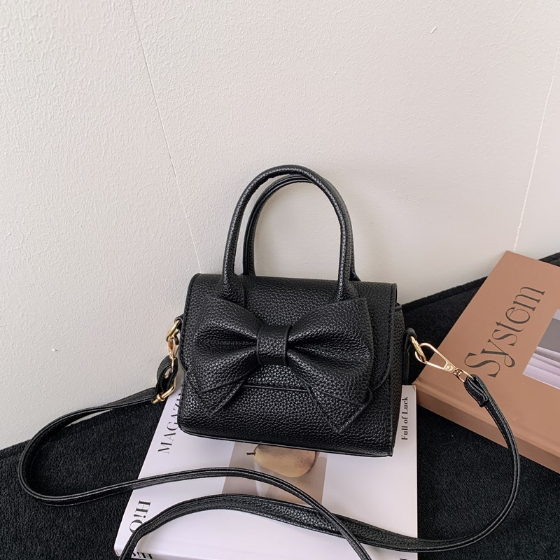 Bolsos infantiles, bolsos de niña transfronterizos, bolsos de hombro de moda coreana para niñas, bolsos portátiles de princesa.