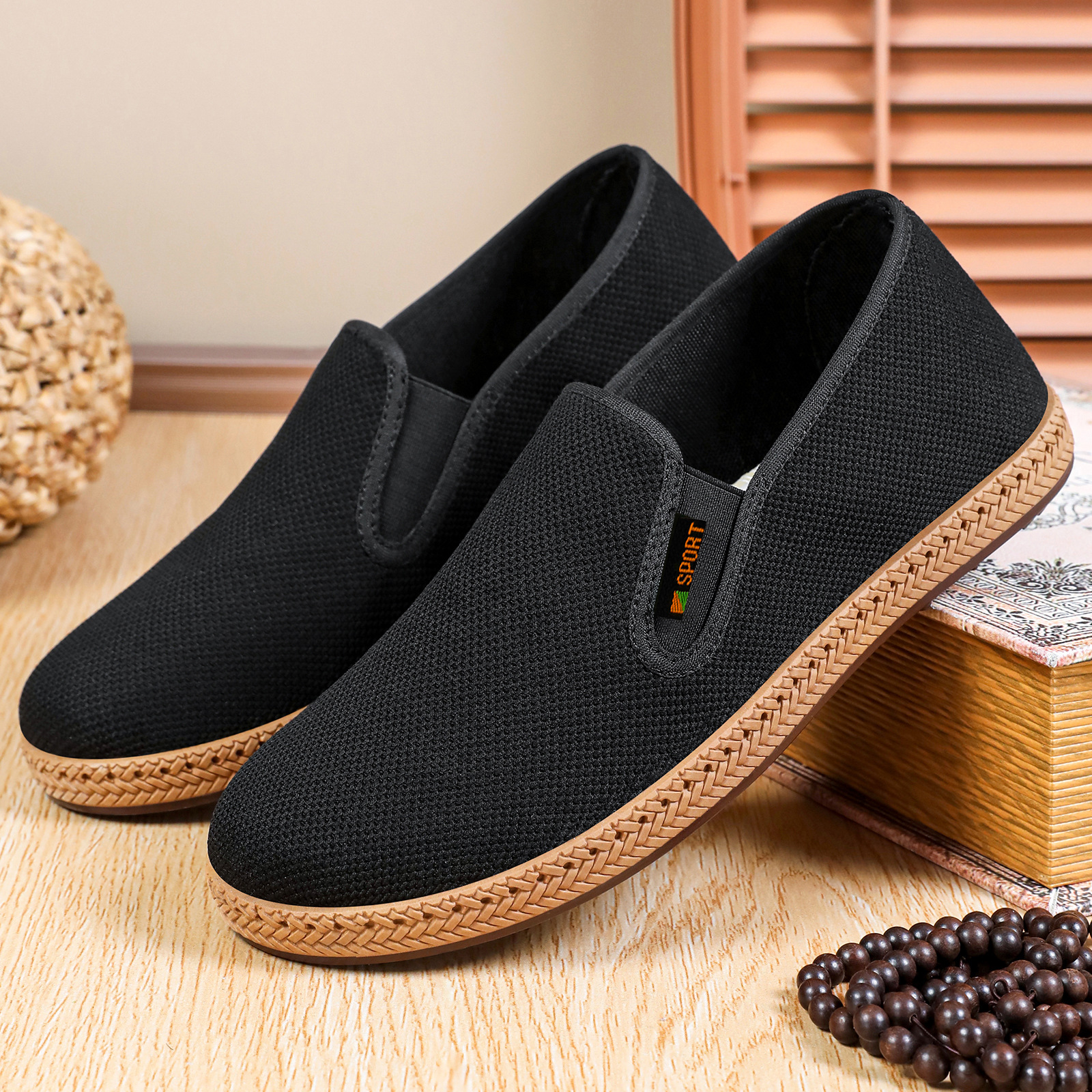 Zapatos de hombre transfronterizos de 18 años tejidos viejos zapatos de tela de Beijing con suela suave no cansados zapatos de padre con un pedaleo de zapatos de edad avanzada