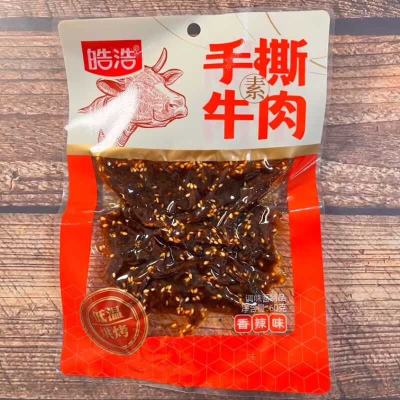 皓浩手撕素牛肉香辣辣条大包60g经典怀旧零食整箱批发皓浩牛肉粒