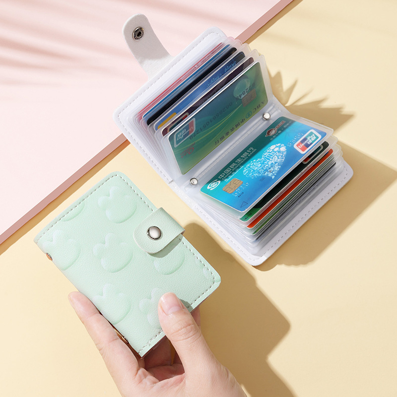 Coreano multifuncional pequeño dibujo animado fresco en relieve conejo 20 tarjeta anti-damagnetizante hebilla vertical bolsa de tarjetas