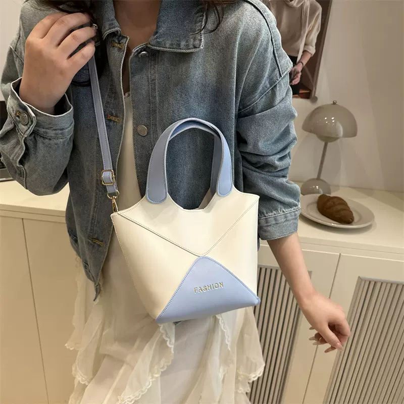 新款包包女2025年水桶包韩版时尚小众复古撞色斜挎手提上班小拎包