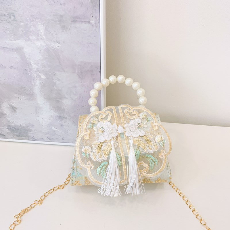 Bolso bandolera para niñas de estilo chino nuevo bolso bandolera para niños con borla portátil de perlas 2024 nuevo bolso de cadena para niños