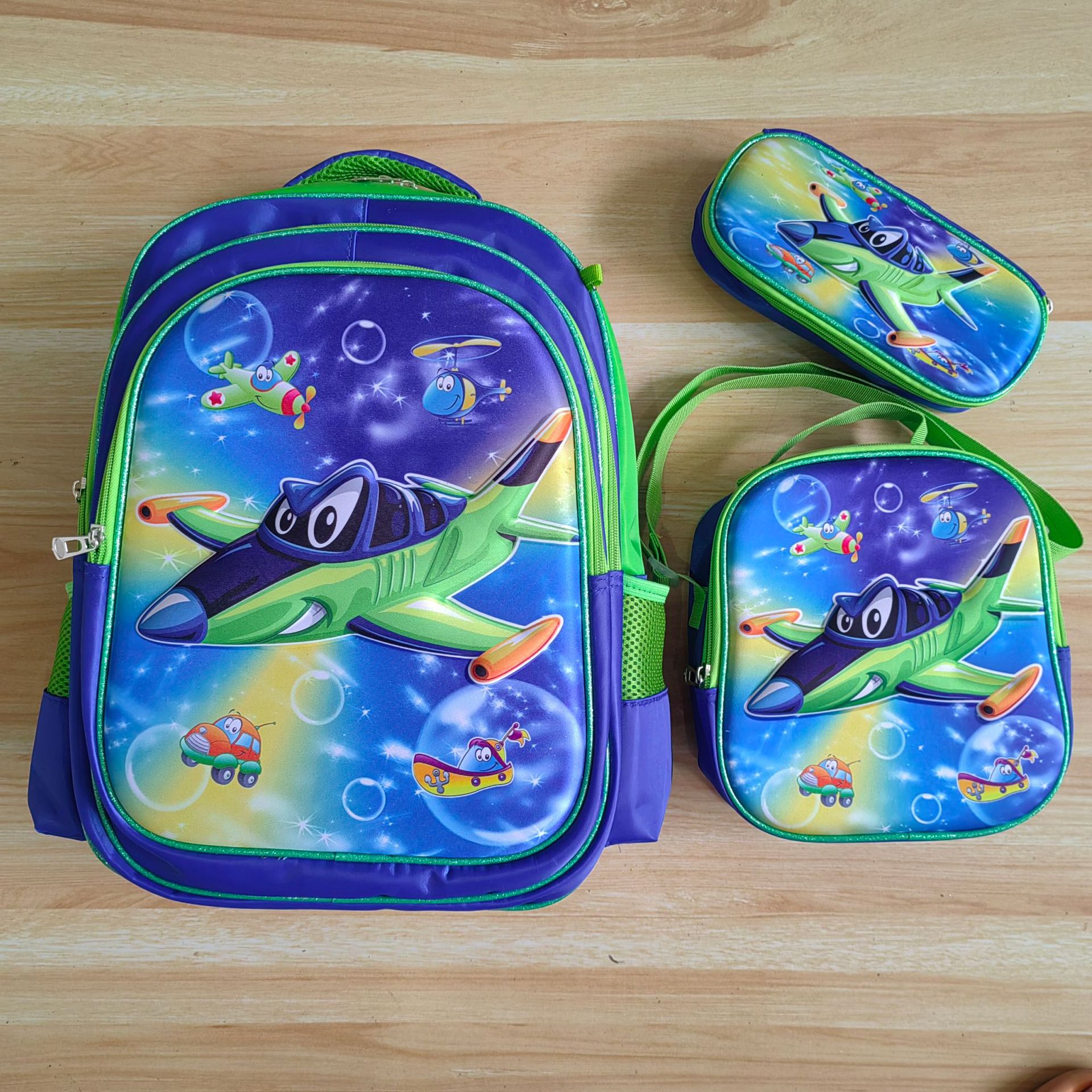 Comercio exterior al por mayor 3D Escuela Primaria estudiante mochila 3-piece set niños dibujos animados mochila lápiz bolsa de almuerzo para grado 1-6