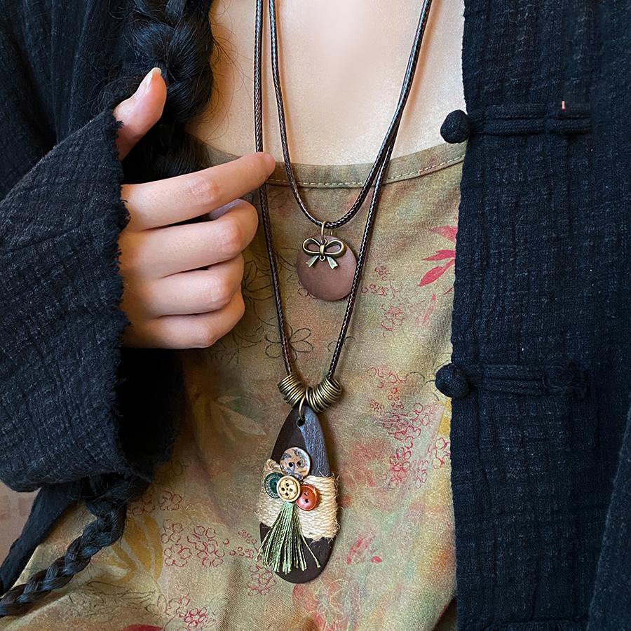 Estilo étnico bowknot ovalado collar de doble capa para mujer nueva cadena de suéter de temperamento retro chino joyería de diseño de nicho