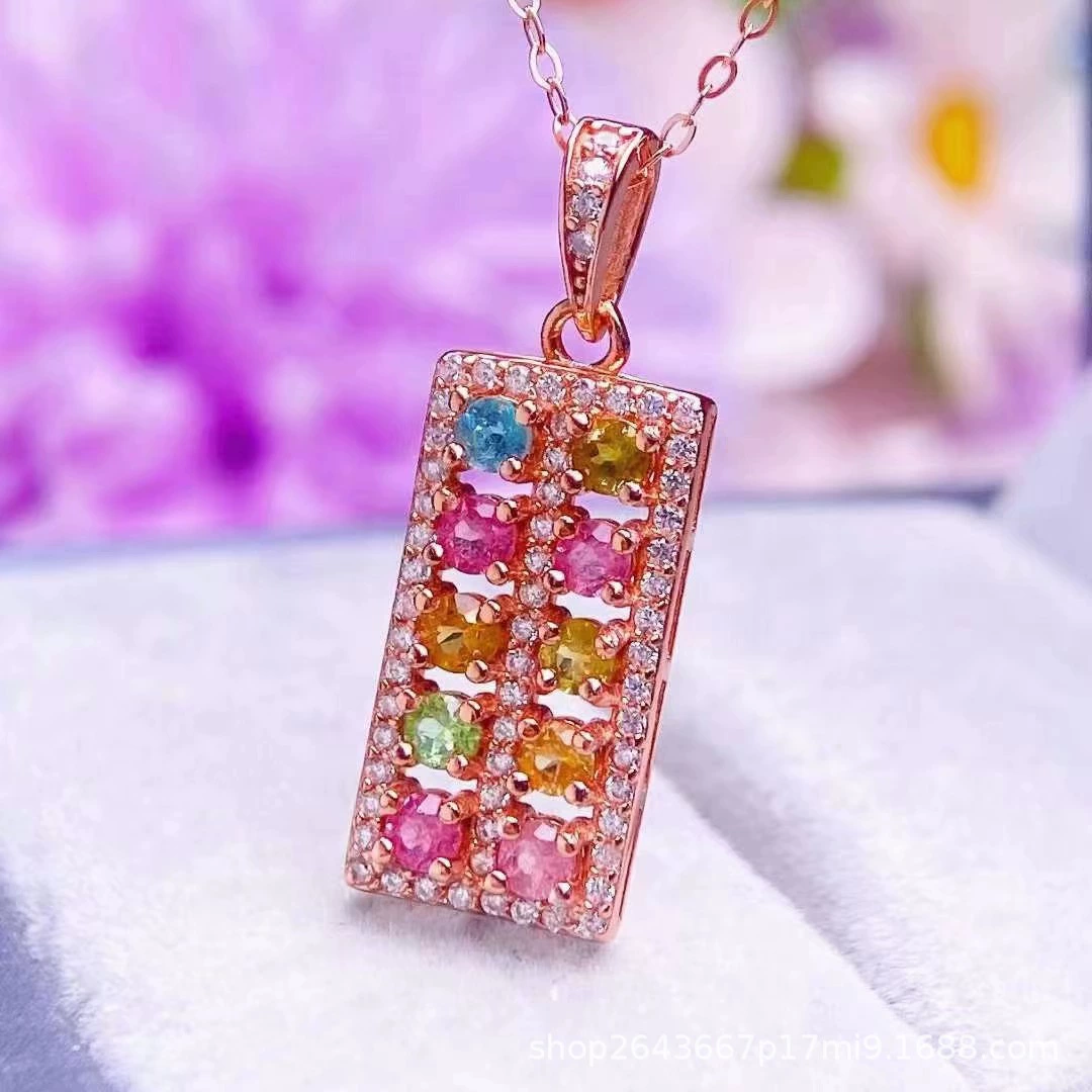 Organic tourmaline pendant, stone inlay, silver 925 sample, style