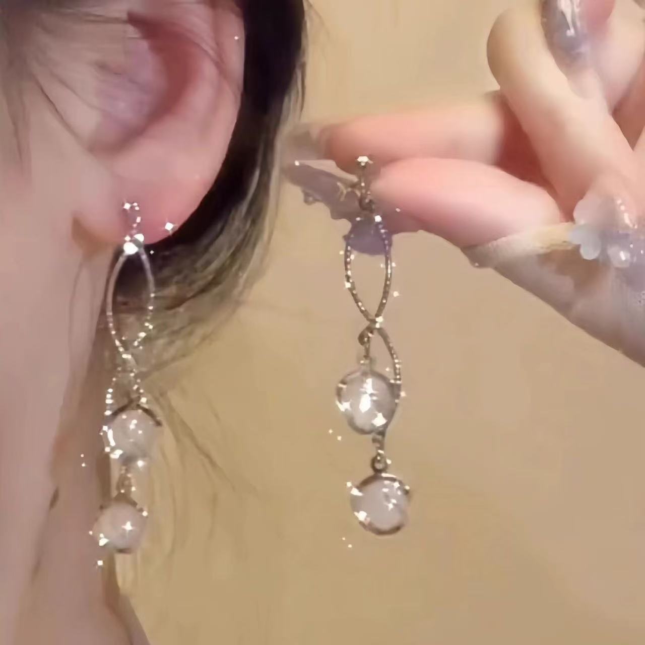 Cat's eye tassel earrings