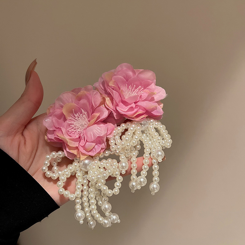 Pendientes de borla de hilo de malla de flor de aguja de plata Pendientes de estilo de vacaciones junto al mar frescos y dulces Pendientes de ambiente de moda y versátil