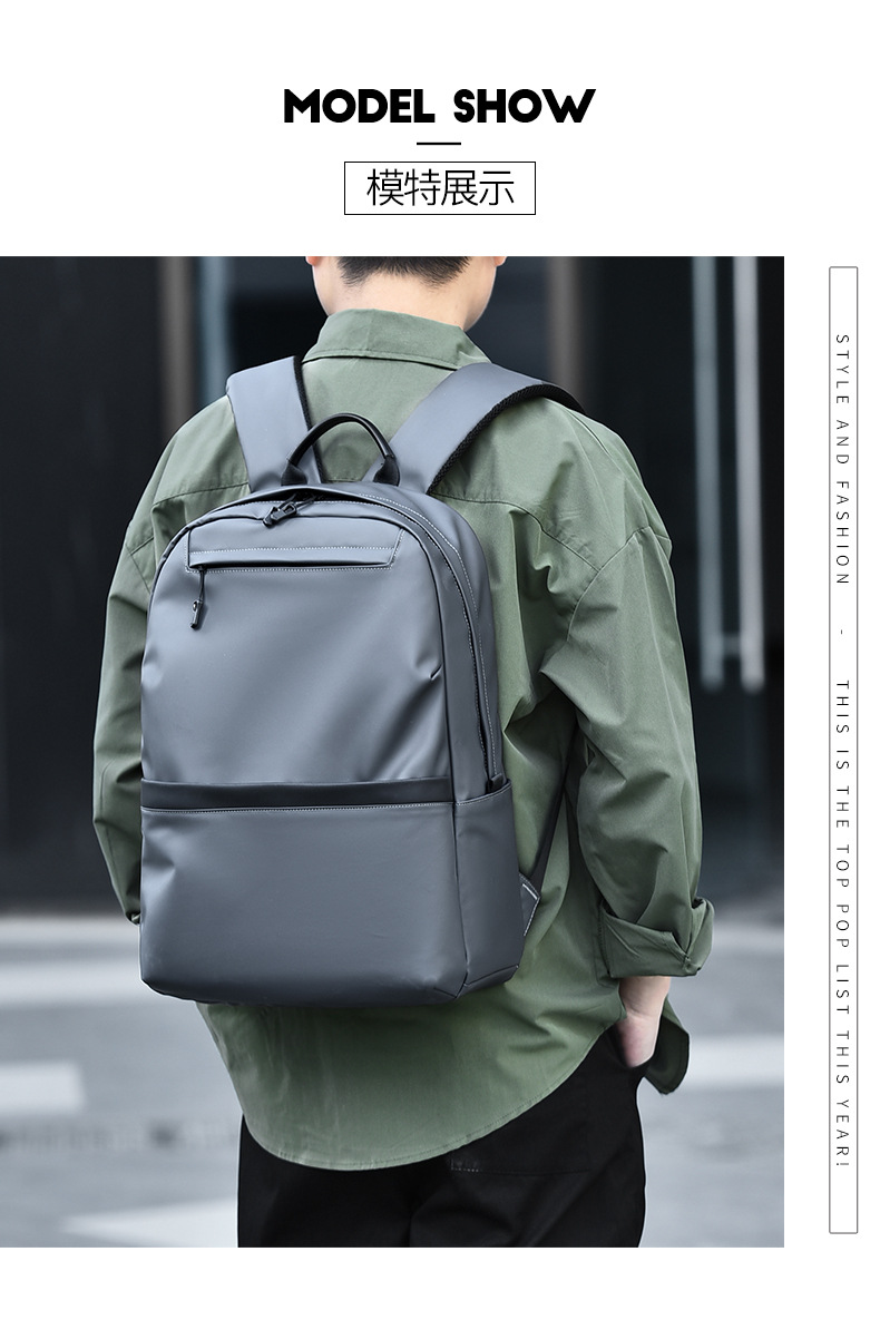 A new minimalist backpack for men, a Korean-style casual and fashionable backpack for laptops, with a logo printed on it undefined