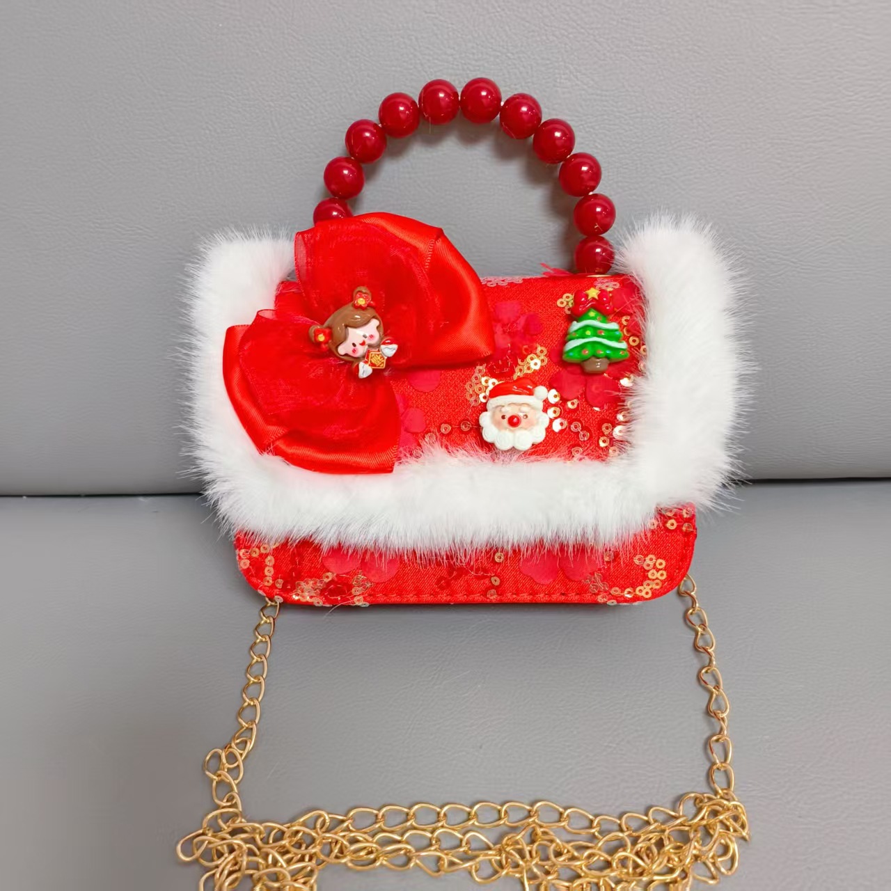 Cartera de Año Nuevo rojo arco de papá Noel bolso de perla pequeña cadena de viento fragante bolso de hombro
