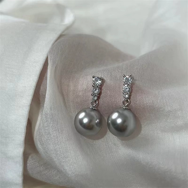 Серебряные серьги-капли с zirconia кисточками белые или серые 18K чистоты, лёгкая роскошь и простая элегантность