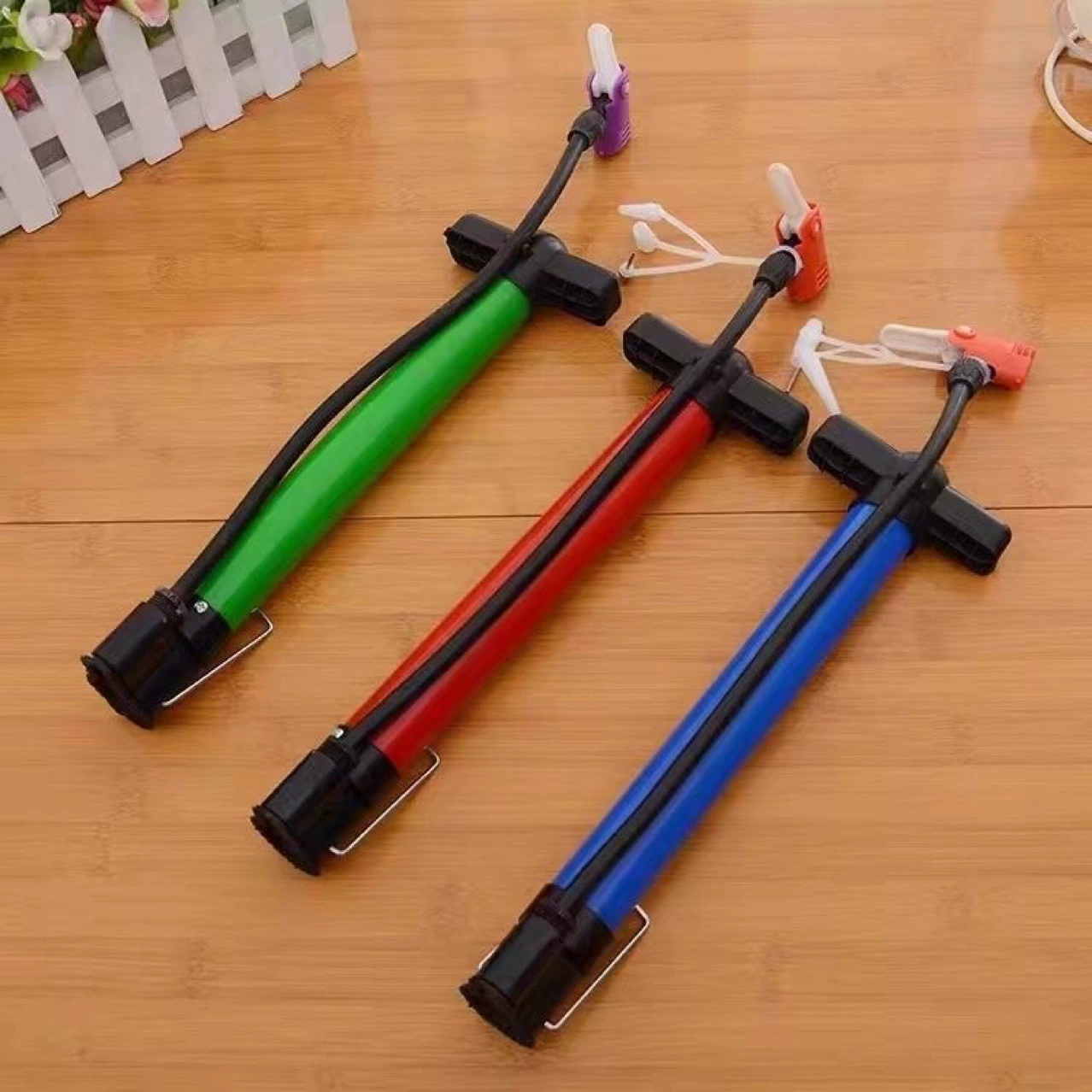 Basketball air pump, inflatable swimming ring, multicoloured handheld bike, small toy