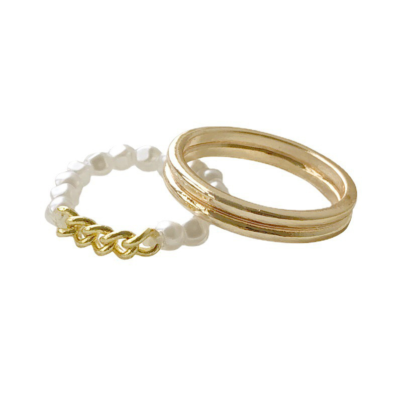Set di anelli di coppia semplici con perle d'acqua dolce e zirconi, design di nicchia di tendenza, perle transfrontaliere, set di anelli di coppia per donne._voghion.com