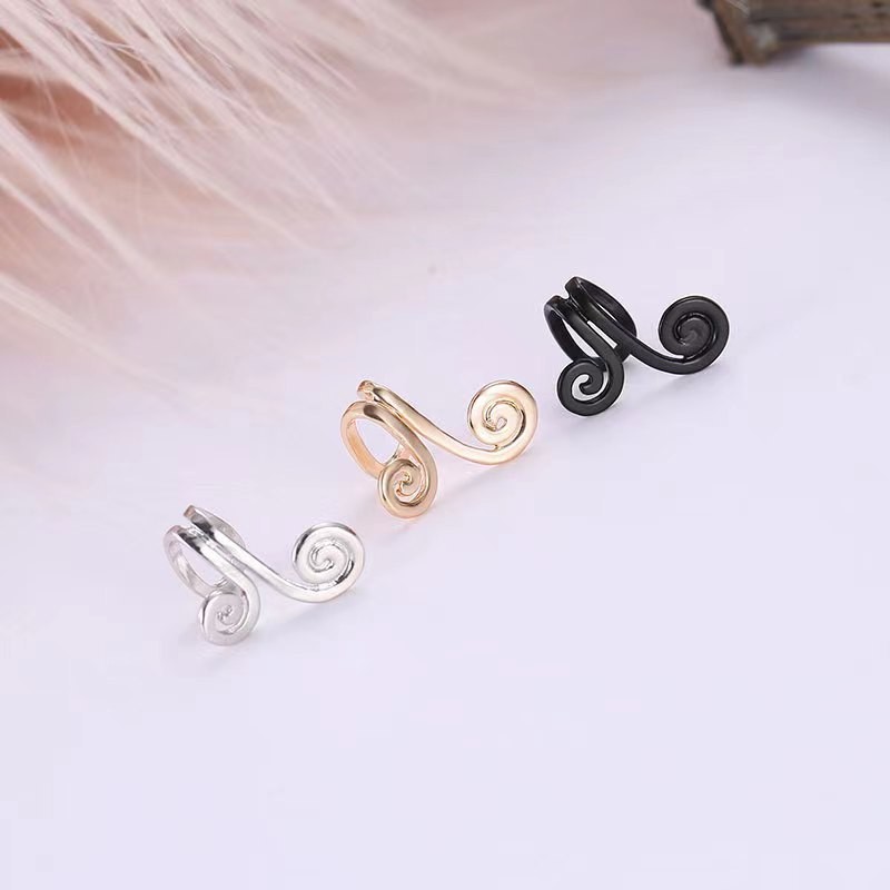 Japonés y coreano personalidad simple moda apretado aro Sun Wukong oreja clip Corea del Sur flor forma earless ear studs precio único